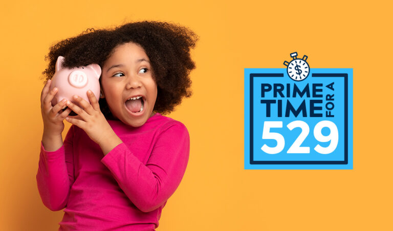 Girl holding piggy bank