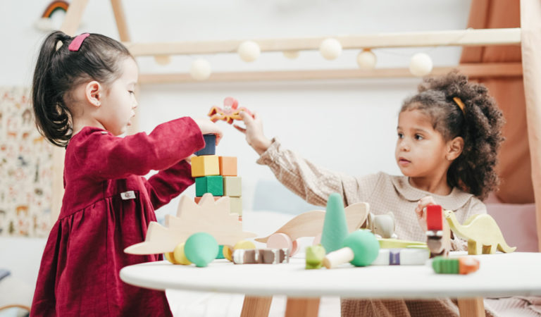 little girls playing in the playroom