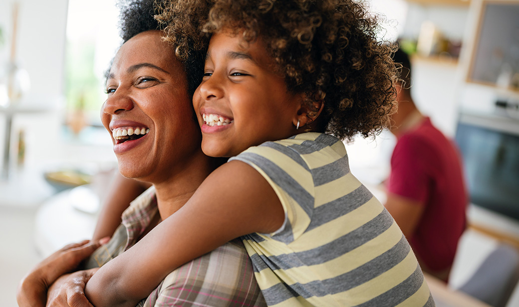 mother and son hugging